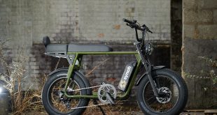 Synch Bike in green in warehouse environment